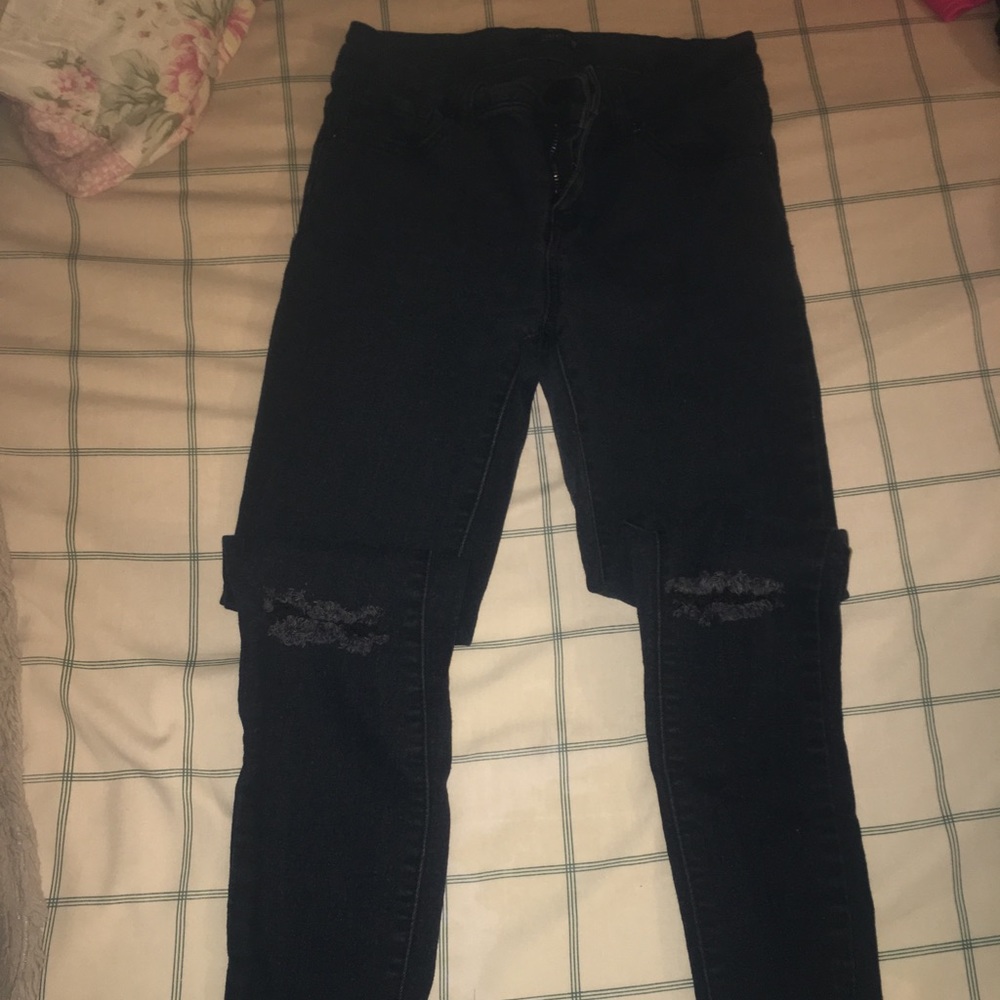 High waisted slit knee jeans